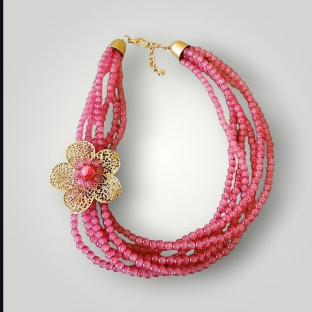 Elegant Pink Beaded Necklace with Gold Flower Accent